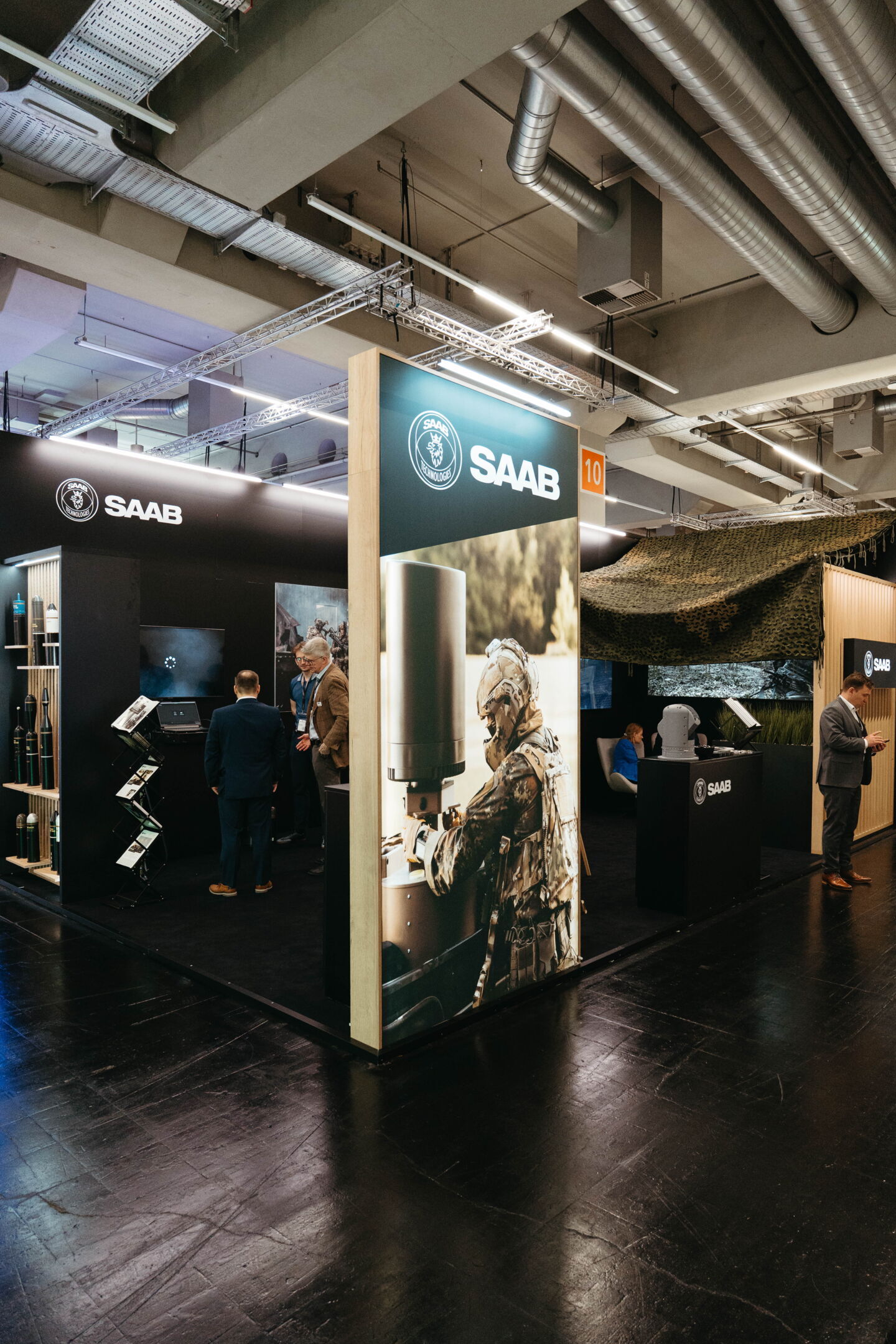 Saab's booth at Enforce Tac with a poster of the L20C